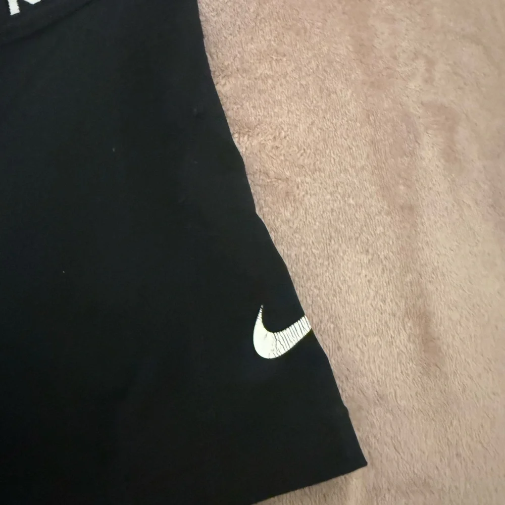 Nike Women's Black Athletic Compression Shorts with White Swoosh